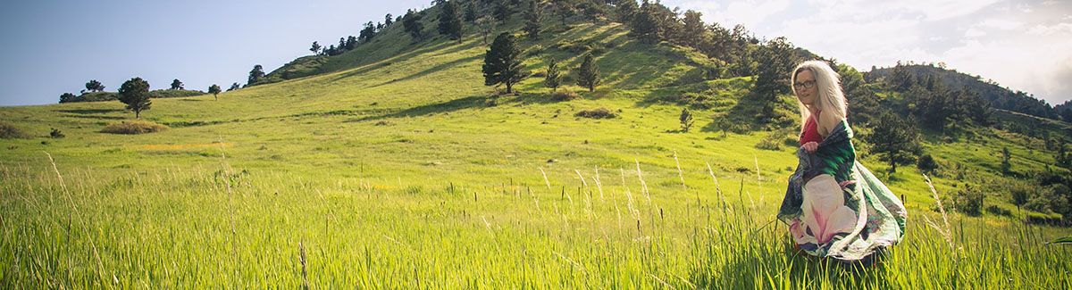 Beth walking in a field